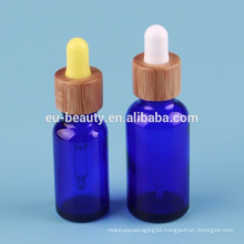 Blue glass bottle wood cosmetic dropper bottle